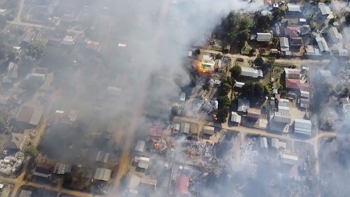 In this image taken from drone video provided by Free Burma Rangers, smoke arises from burning buildings in Waraisuplia village in Kayah State, Myanmar on Feb. 18, 2022.