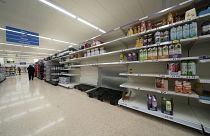A view of empty shelves at a Tesco supermarket in Manchester, England, Sunday, Sept 12, 2021.
