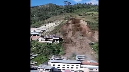 Hillside collapse buries at least 15 houses in Peru