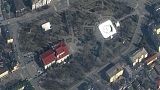 A satellite image shows a sign saying "Children" in Russian written in front of the Drama Theatre in Mariupol, on 14 March 2022