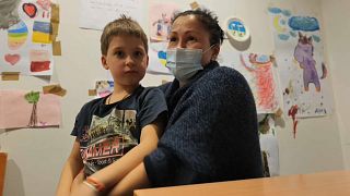 Julia, a Ukrainian refugee and her son