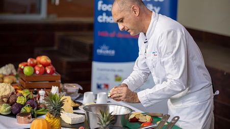Live cooking demonstration by chef Charles Soussin at the France pavilion