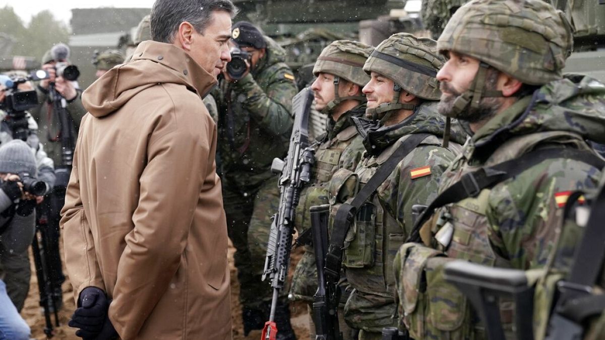 Prime Minister of Spain Pedro Sanchez speaks to Spanish troops during his visit to Adazi Military base in Kadaga, Latvia, Tuesday, March. 8, 2022. 