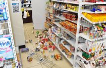 Products are scattered at a convenience store in Fukushima, northern Japan Wednesday, March 16, 2022, following an earthquake.