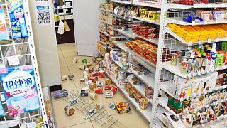 Products are scattered at a convenience store in Fukushima, northern Japan Wednesday, March 16, 2022, following an earthquake. 