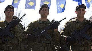 Kosovo Security Force members march during the celebration to mark the 11th anniversary of independence in Pristina