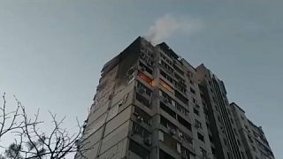 Fire at Kyiv building hit by parts of downed rocket