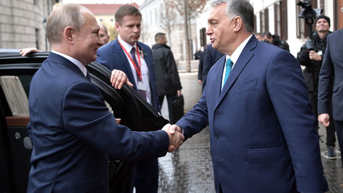 Hungarian Prime Minister Viktor Orban, right, greets Russian President Vladimir Putin upon his arrival in Budapest, Hungary, Wednesday, 30 Oct, 2019