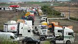 Lorry drivers gather during a demonstration against surging fuel prices in Pamplona.