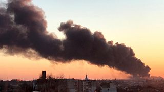 A cloud of smoke raises after an explosion in Lviv, western Ukraine, Friday, March 18, 2022.