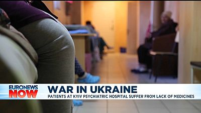 A doctor walks in a hospital basement, used as a bomb shelter, during an air raid alarm in Kyiv.