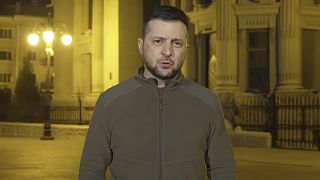 In this image from video provided by the Ukrainian Presidential Press Office, Ukrainian President Volodymyr Zelenskyy speaks from Kyiv, Ukraine, early Saturday, March 18, 2022