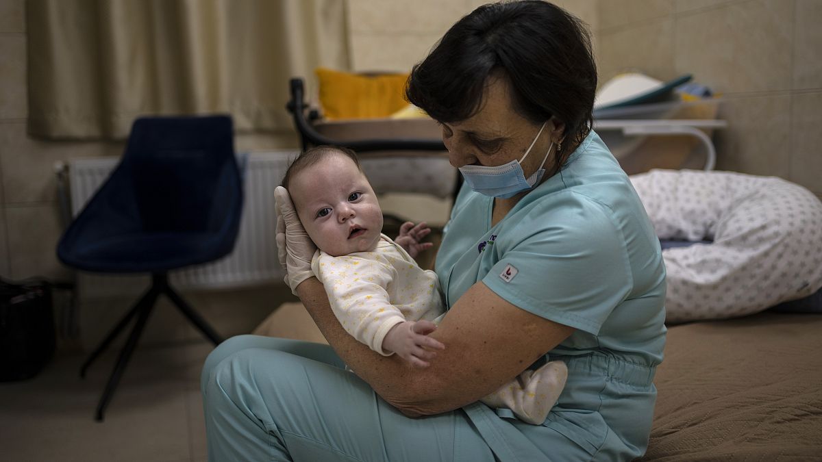  A newborn baby in a basement converted into a nursery in Kyiv, Ukraine.
