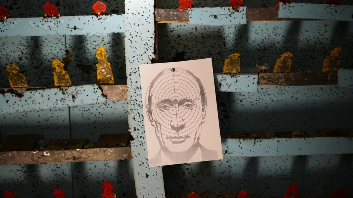 A picture of Russian President Vladimir Putin hangs at a target practice range in Lviv, western Ukraine, March 17, 2022.