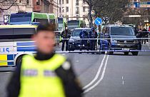 Police officers attend the scene at a school in Malmo, Sweden on Monday, March 21, 2022