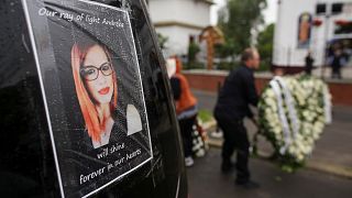 A picture of the Romanian victim of the March 22 terrorist attack in London, Andreea Cristea, is placed on a vehicle, in Constanta