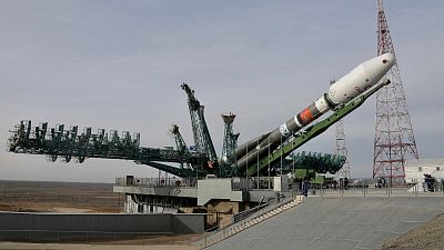 A Soyuz-2.1b rocket booster with OneWeb satellites is removed from a launchpad after the launch was cancelled at the Baikonur Cosmodrome, Kazakhstan March 4, 2022