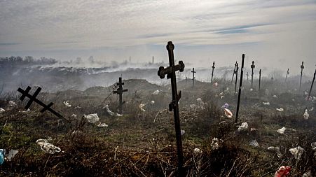 Graves dug in Ukraine, amid the Russian invasion.