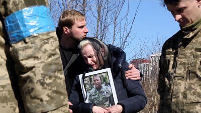 Grieving wife and son mourn the death of Yuriy Shabadash