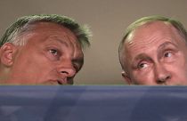 Russian President Vladimir Putin, right, and Hungarian Prime Minister Viktor Orban, left, arrive at the World Judo Championships as they meet in Budapest, Hungary, August 2017