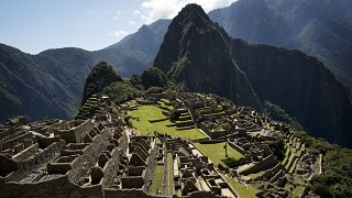 The ruins of Machu Picchu are seen from a high vantage point, in the Cusco region of Peru, Saturday, June 18, 2016. 