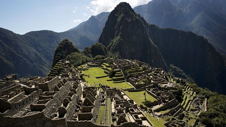 The ruins of Machu Picchu are seen from a high vantage point, in the Cusco region of Peru, Saturday, June 18, 2016.