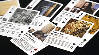 Some of the playing cards featuring works of art lost in World War II created by the Monuments Men Foundation.