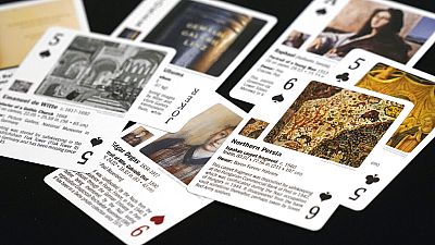 Some of the playing cards featuring works of art lost in World War II created by the Monuments Men Foundation.