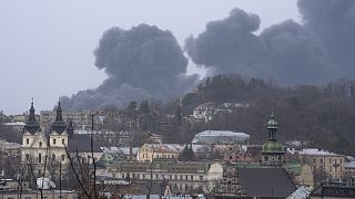 Smoke rises in the air in Lviv, western Ukraine, Saturday, 26 March 2022