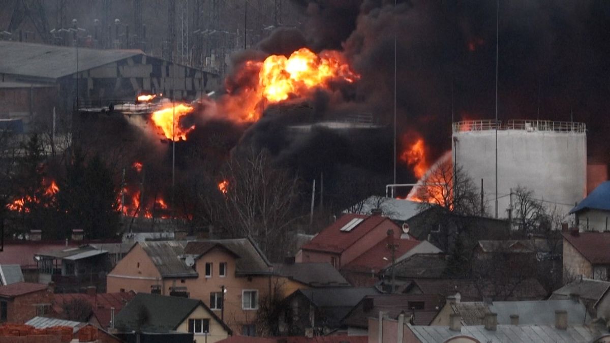 People flee site of missile strike on Lviv
