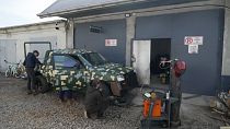 Lviv volunteers adapt vehicle for military use