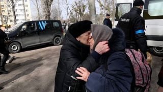 Olha Molchanova, greeted by family after arriving in Kyiv after escaping from the frontline Ukrainian town of Irpin.