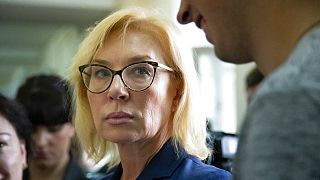 Ukrainian ombudswoman for human rights Lyudmila Denisova speaks to relatives of Ukrainian sailors outside a courtroom in Moscow, Russia, Wednesday, July 17, 2019