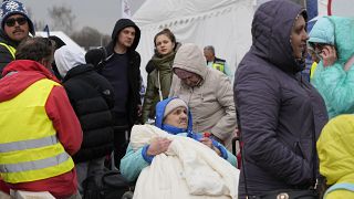 لاجئون أوكرانيون عند المعبر الحدودي في ميديكا، جنوب شرق بولندا، يوم الثلاثاء ، 29 مارس 2022