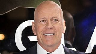 Actor Bruce Willis poses for photographers upon arrival at the premiere of the film 'Glass', in London, Wednesday, Jan. 9, 2019