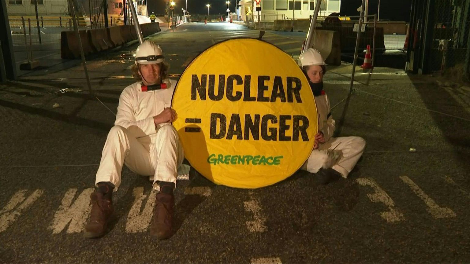 Greenpeace activists blocking access to the site of the Flamanville EPR nuclear reactor 