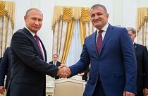 Russian President Vladimir Putin (L) and Anatoly Bibilov, the leader of Georgia's breakaway region of South Ossetia (R) meet in 2018.