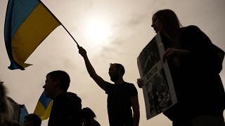 People shout slogans during a protest by pro-Ukraine people against Russia's invasion of Ukraine in Istanbul at the same time as peace talks in Turkey, Tuesday, March 29, 2022