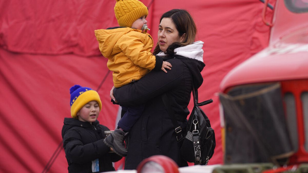 Refugees from Ukraine arrive to the border crossing Vysne Nemecke, Slovakia, Tuesday, March 1, 2022. 