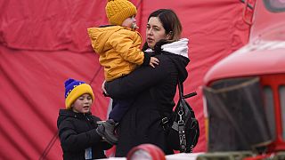 Refugees from Ukraine arrive to the border crossing Vysne Nemecke, Slovakia, Tuesday, March 1, 2022. 