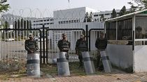 Pakistani paramilitary troops stand guard with riot gears outside the National Assembly, in Islamabad, Pakistan, Sunday, April 3, 2022.