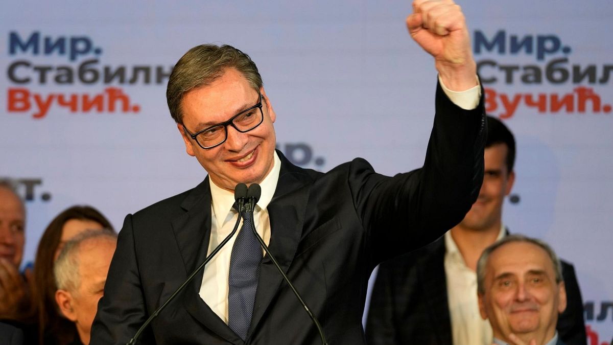 Serbian President and presidential candidate Aleksandar Vucic gestures after claiming victory in the presidential election in Belgrade, Serbia, Sunday, April 3, 2022.