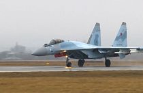 Russian Su-35 fighter jet taking off.