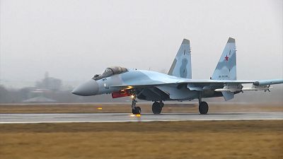 Russian Su-35 fighter jet taking off.