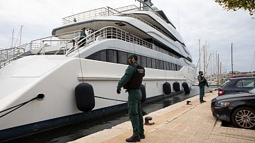 Civil Guards stand by the yacht called Tango in Palma de Mallorca, Spain, Monday April 4