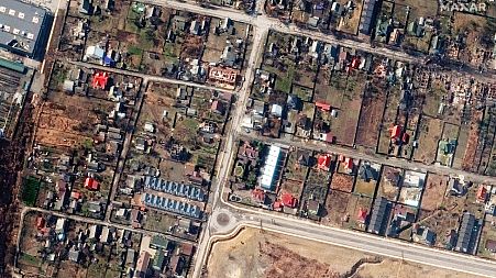 This handout satellite image released by Maxar Technologies on April 4, 2022 shows a view of Yablonska Street in Bucha, Ukraine, on March 31, 2022.