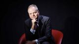 Eike Schmidt, poses for portraits before holding a press conference at the Foreign Press Club in Rome.