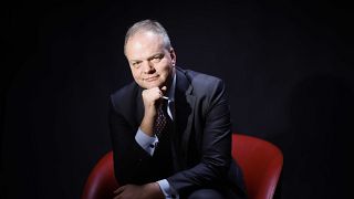 Eike Schmidt, poses for portraits before holding a press conference at the Foreign Press Club in Rome.