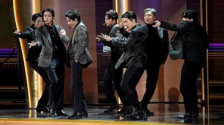 BTS performs "Butter" at the 64th Annual Grammy Awards on Sunday, April 3, 2022, in Las Vegas.
