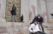 Scientist Rebellion splattered 'blood' across the front of the Spanish Parliament Building